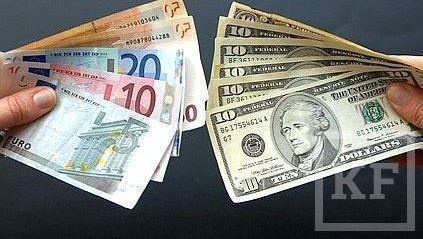 Курс доллара в первые минуты валютных торгов на Московской бирже в понедельник снизился на 9 копеек — до 31