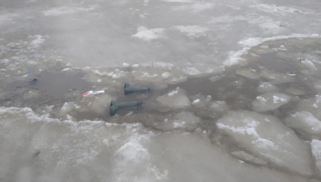 В воде лежали сапоги пропавшего.